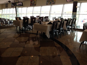The restaurant at the Speedway.  Lunch is buffet and costs between $8 and $12.  Dinner is off the menu and a tad bit pricey, but nothing too outrageous.